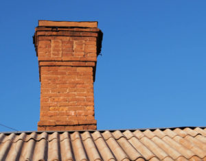masonry chimney with blue sky