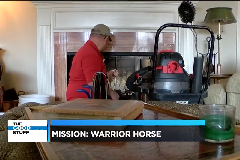 New Buck cleaning a fireplace on the news show "The Good Stuff"